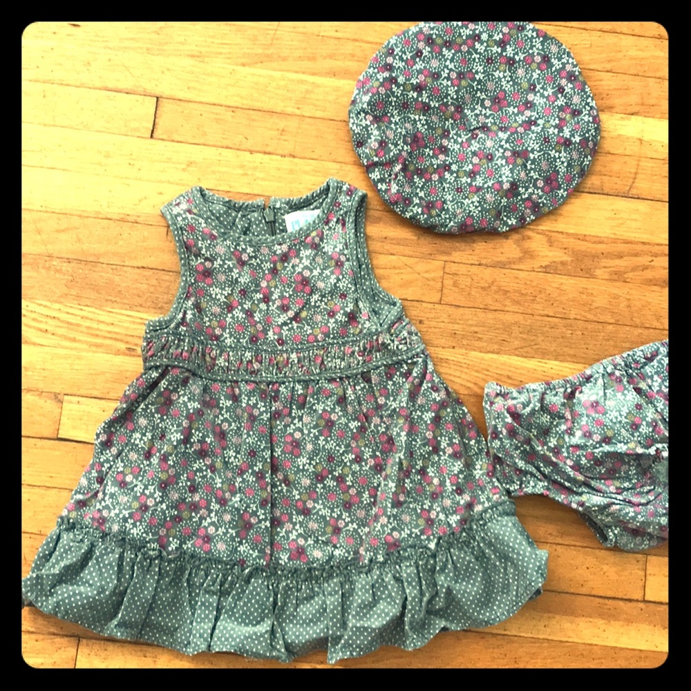 A floral corduroy dress with a beret